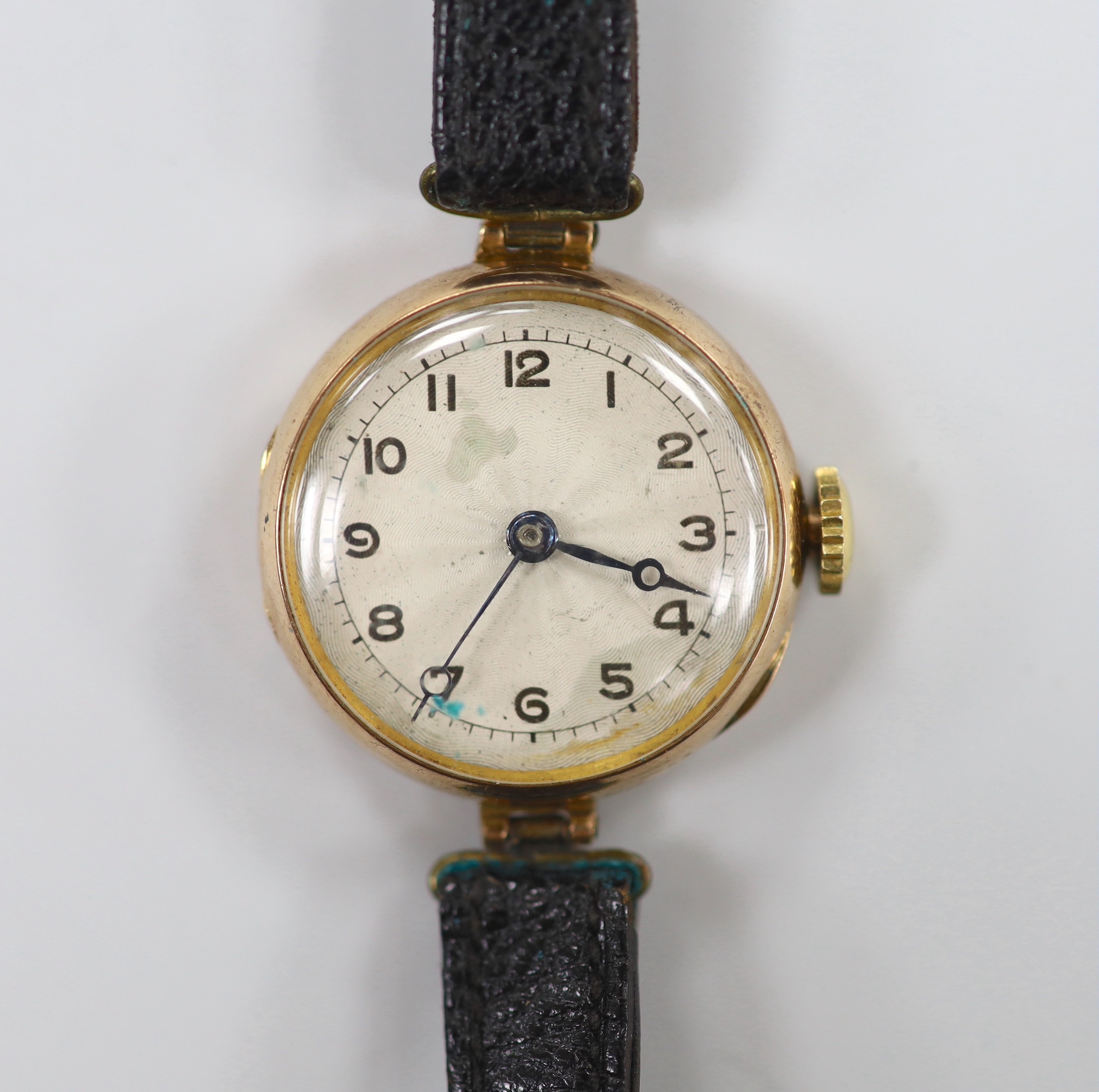 A lady's late 1920's 9ct gold Rolex manual wind wrist watch, with sunburst Arabic dial, on associated leather strap, case diameter 27mm and a fob watch.